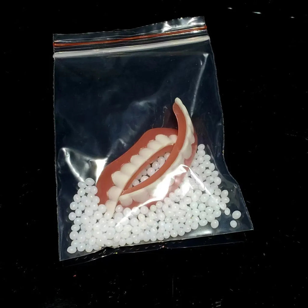 Silicone simulation dentures for dental training with upper and lower teeth in colour box packaging