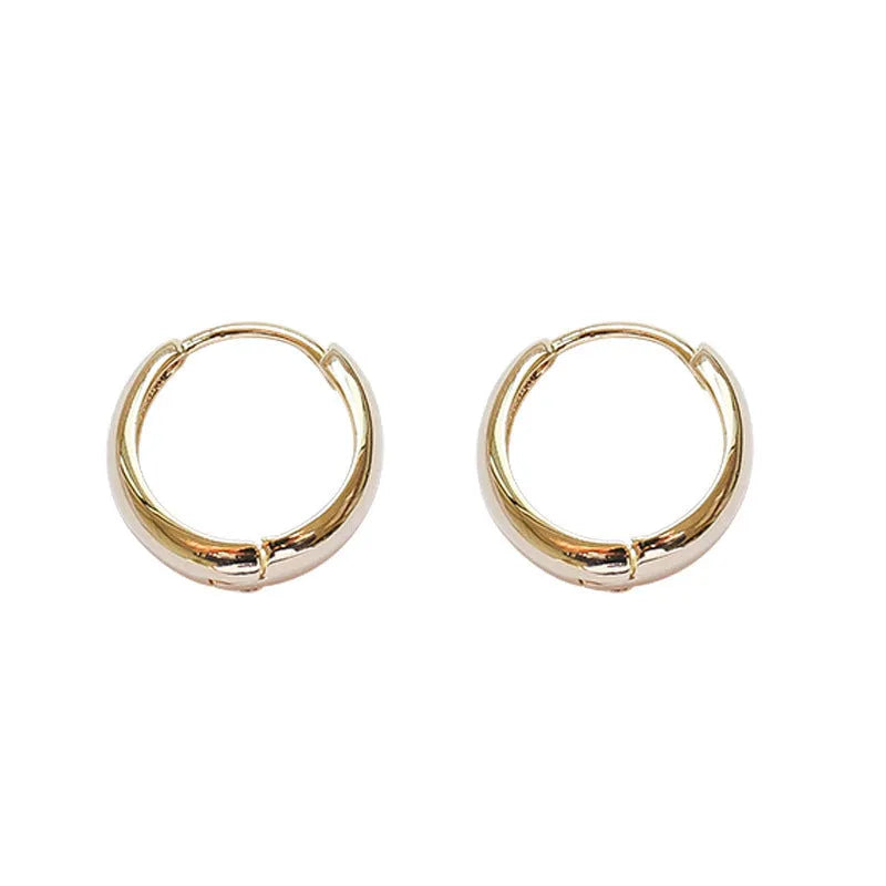Geometric water drop earrings in gold or silver on a copper base, shown in small, medium, and large sizes.