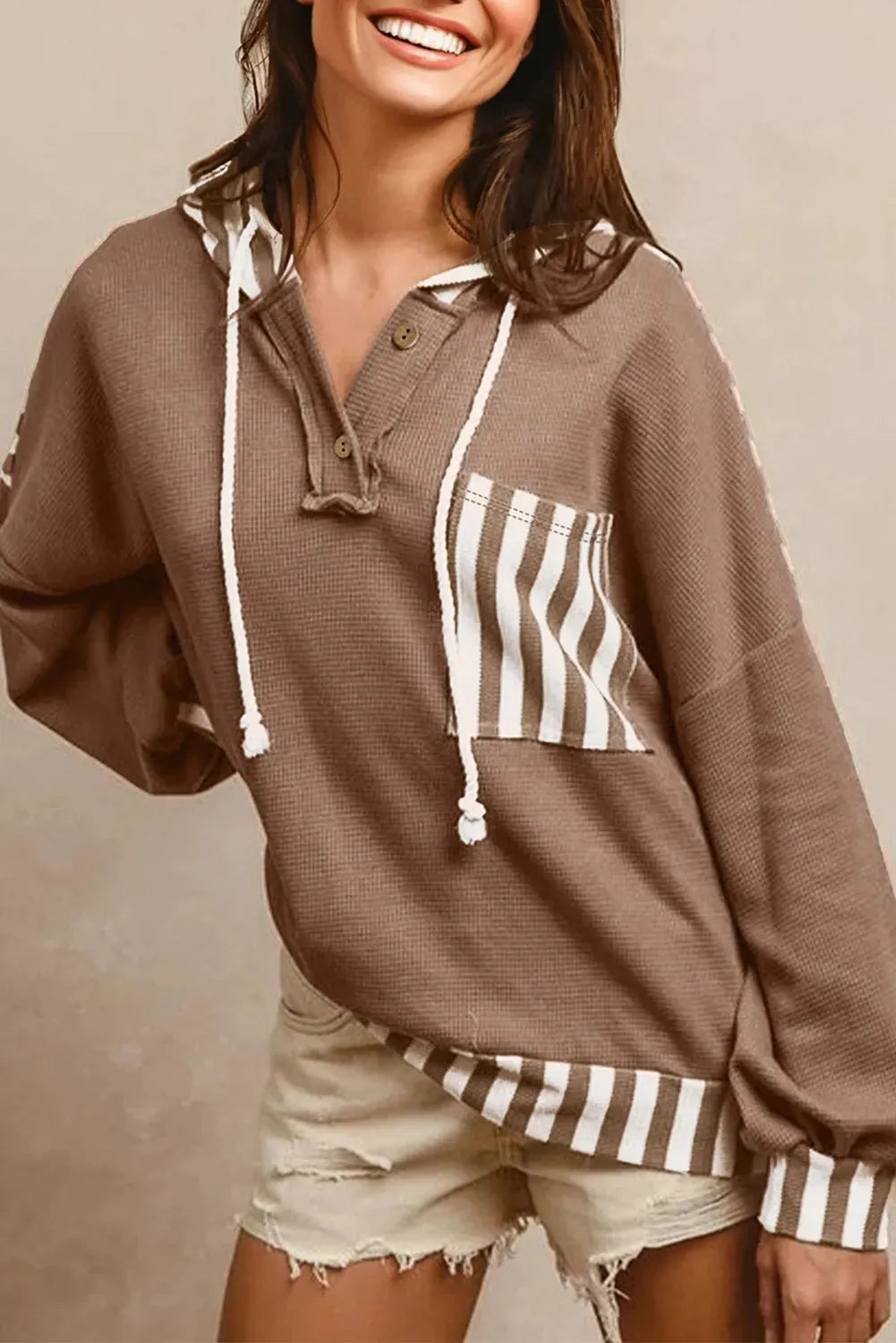 Straw yellow women's hoodie with waffle texture, striped patchwork, button neck and drawstring hood