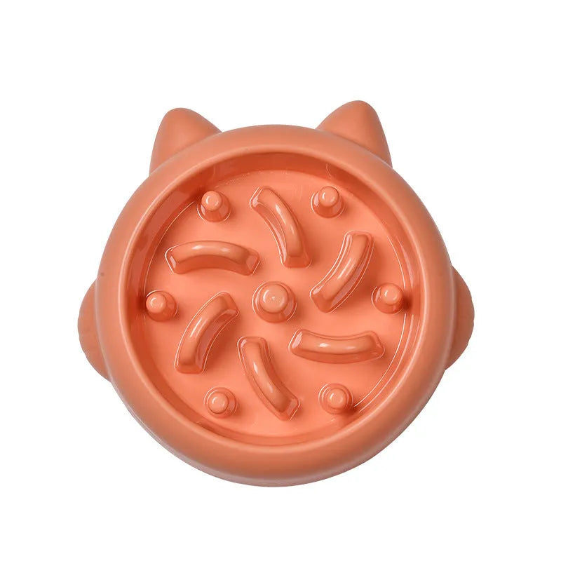 Green pet slow feeder bowl with bone-shaped ridges inside to slow down eating