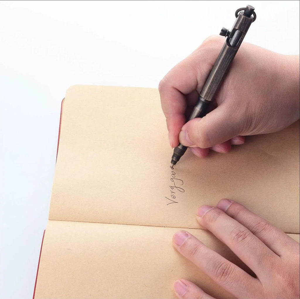 Brass hexagonal bolt tactical pen showing machined details and hexagonal design
