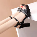 Women's high heel sandals with T6 strap in black PU, side view, size 38