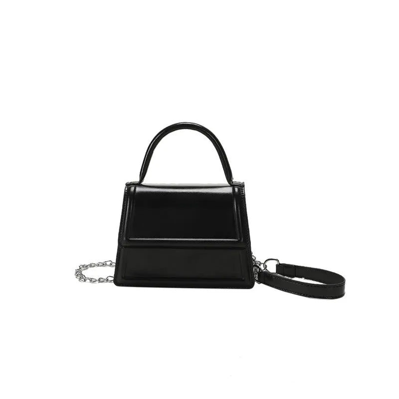 Retro PU crossbody shoulder bag in horizontal square shape showing sewing line details