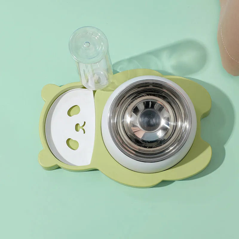 Grey and green tilted elevated pet bowl set with automatic water dispenser bottle for cats and small dogs.