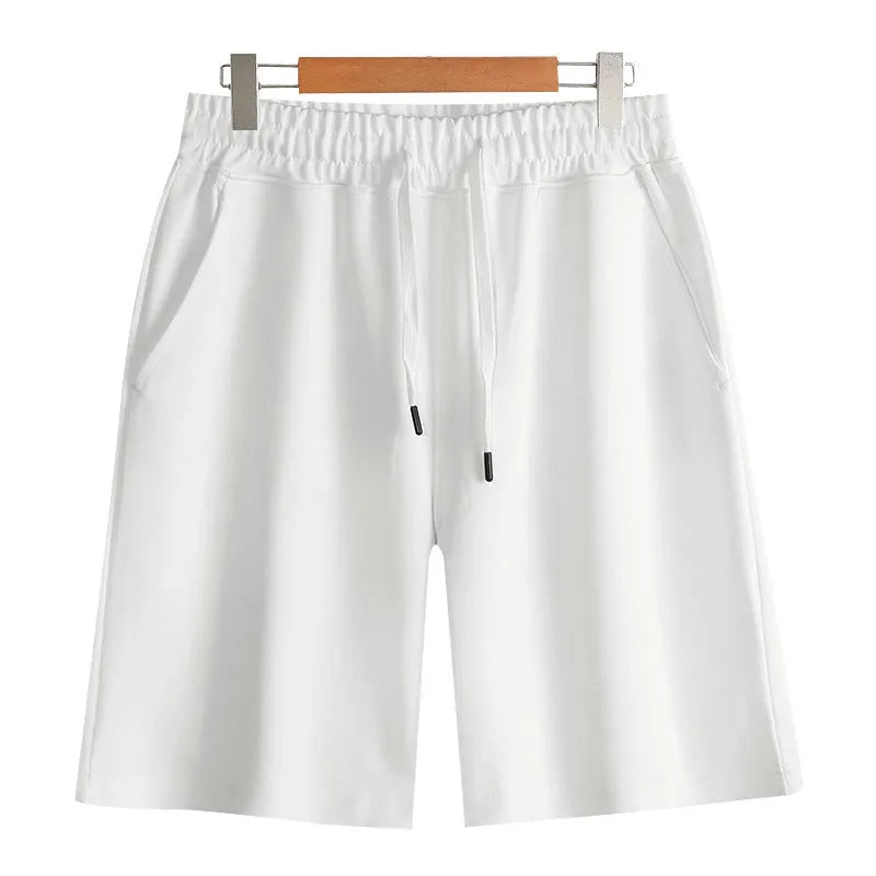 Straight-leg cotton sports shorts in light grey on a neutral background.