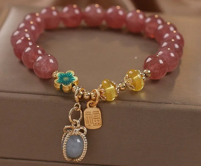 Red strawberry quartz beaded bracelet with alloy components and rhinestone accents for women