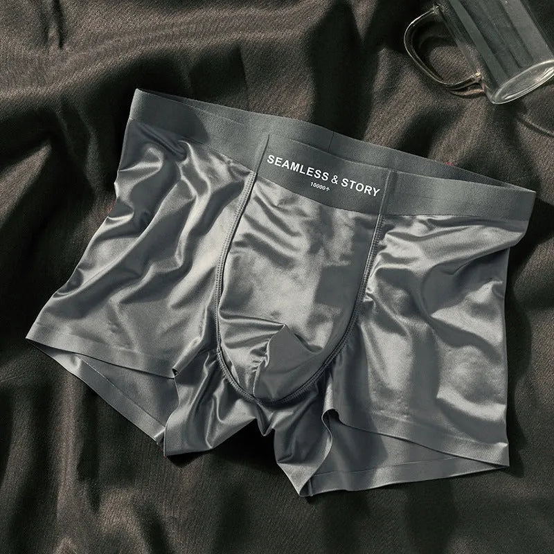 Men's ice silk underwear set in blue colour showing mid waist design and smooth satin fabric