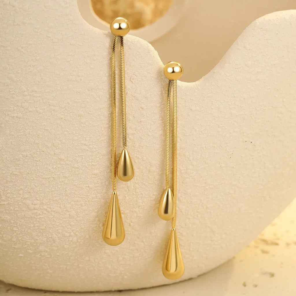 Stainless steel tassel water drop earrings with Y-word chain ornament in 18K gold electroplated finish, geometric drop-shaped design