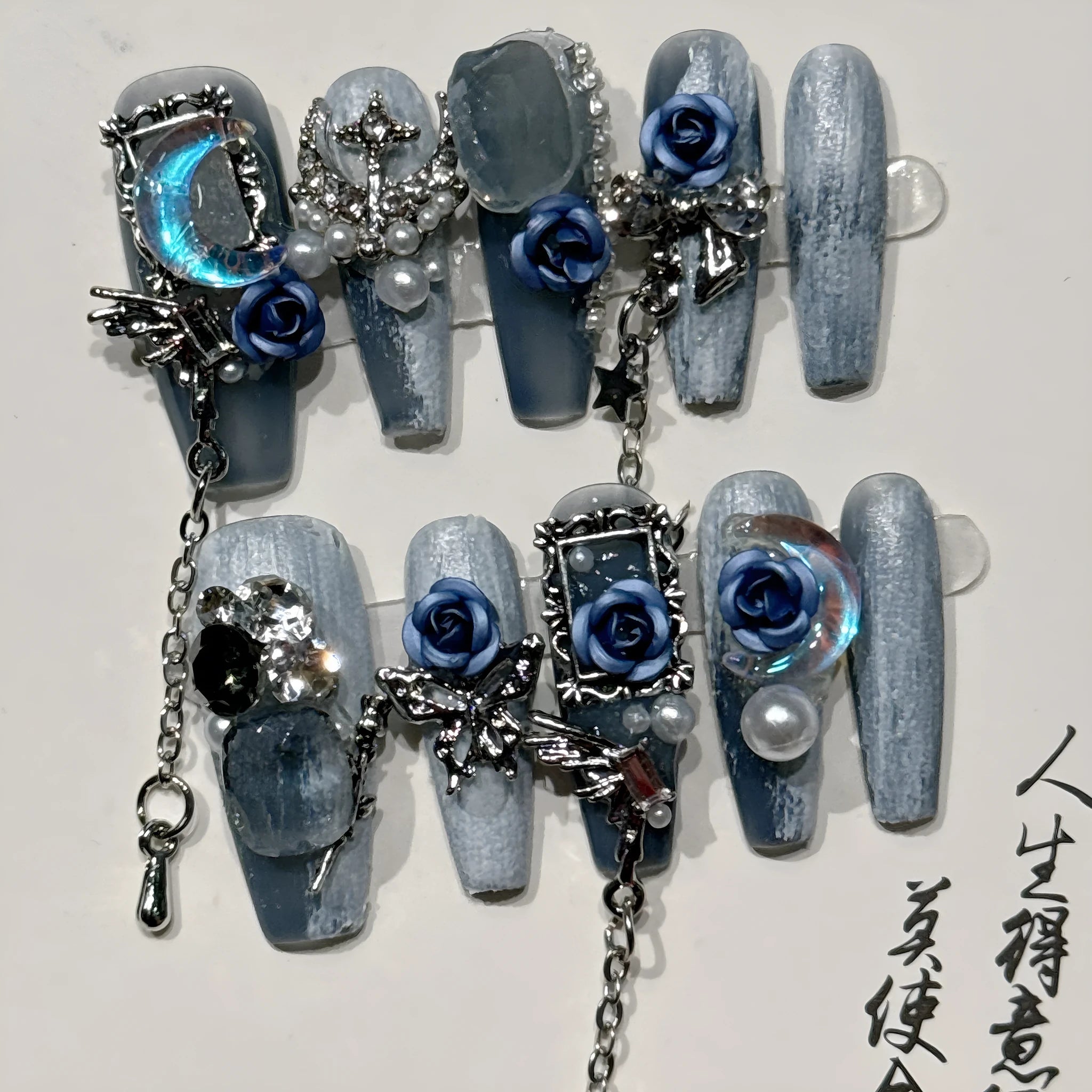 Blue plastic manicure armour suit with ornate rose and tulip floral patterns for evening wear.