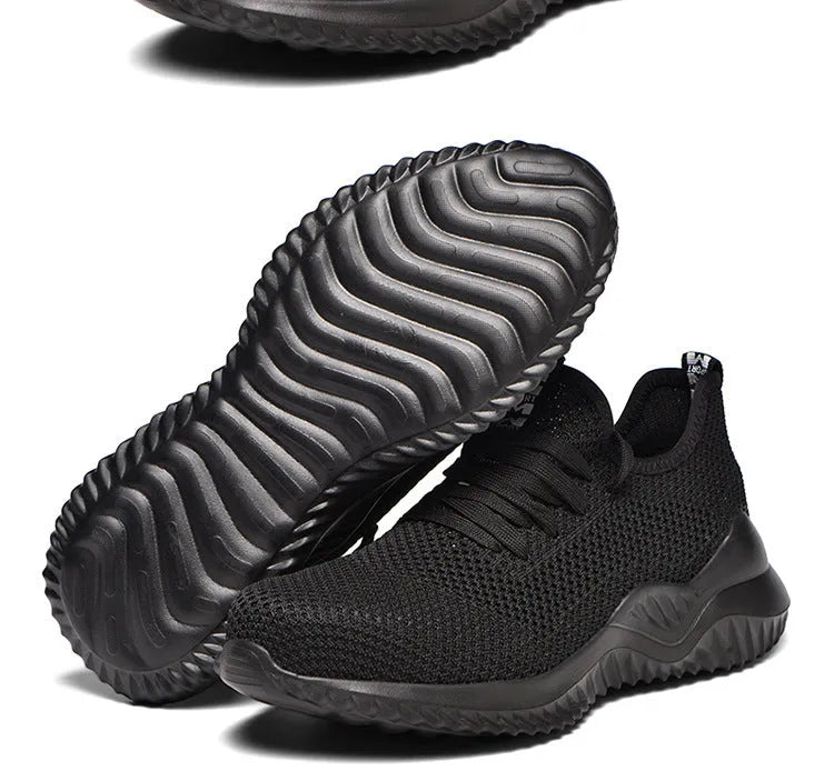 Black low-cut steel toe cap safety work shoes with antistatic EVA sole.