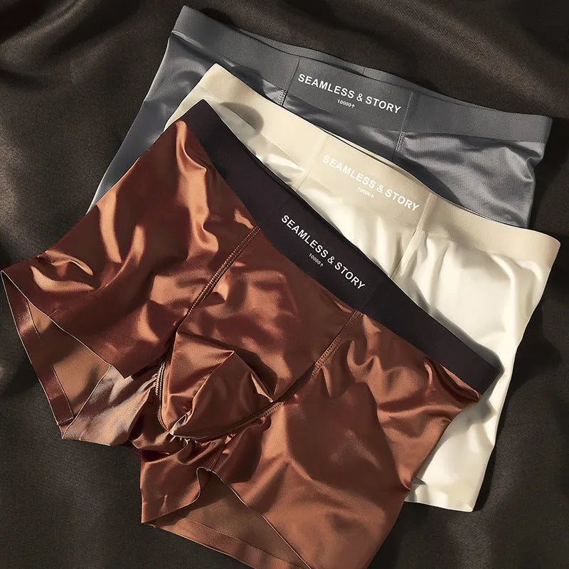 Men's ice silk underwear set in blue colour showing mid waist design and smooth satin fabric