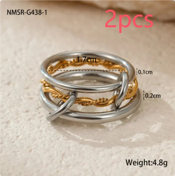 Stacked stainless steel ring with 18K gold plating in three colour variants for women's hand jewellery