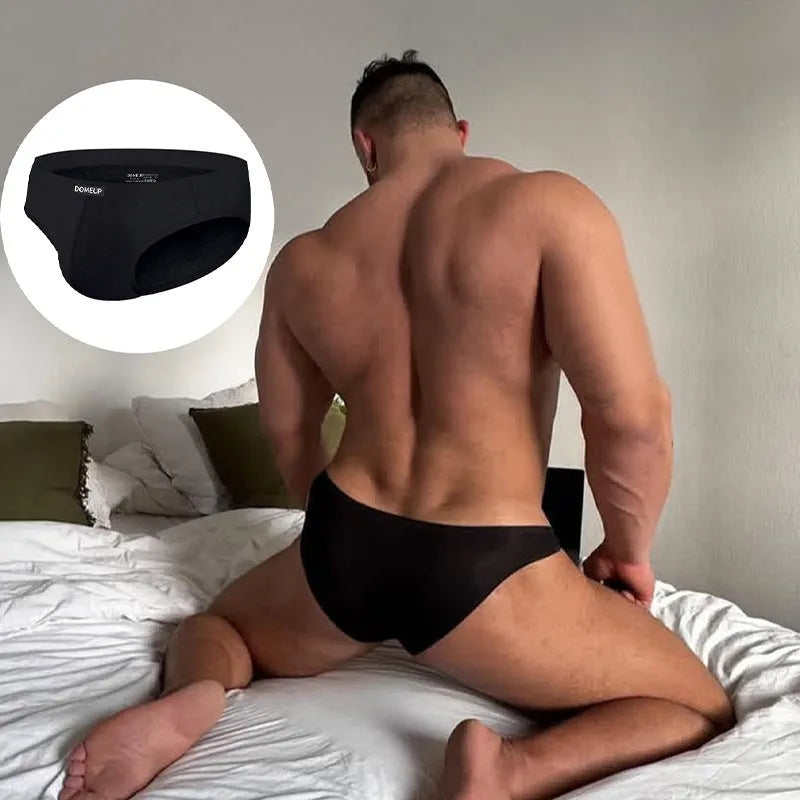 Men's seamless low waist briefs in black, white, or pink with hip-lifting function