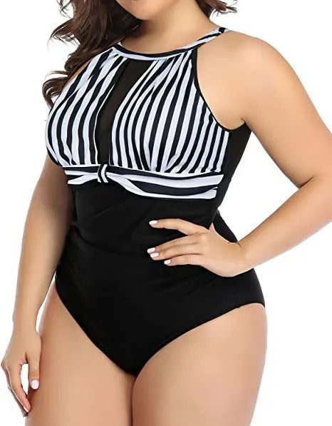 Women's black lace-trimmed one-piece swimsuit on a mannequin, showing front and back views.
