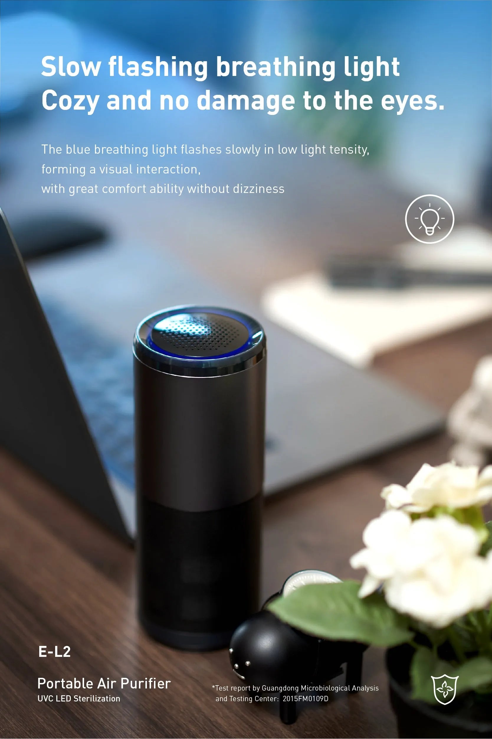 Black portable mini car air purifier with USB cable on a car dashboard