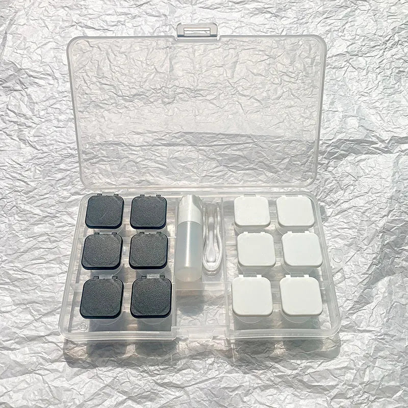 Portable rectangular contact lens case in various colours with a compact design.