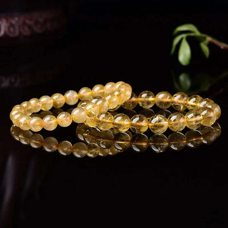 Natural crystal bracelet with 10mm clear beads on 19cm circumference elastic cord