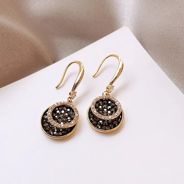 Black retro Hong Kong style geometric round earrings measuring 3.6cm length with alloy construction