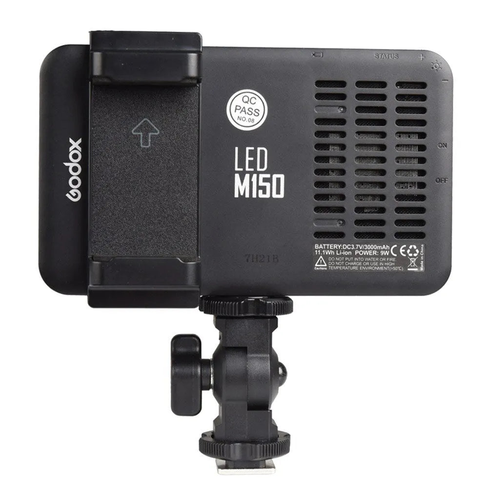 Slim silver Shenniu M150 LED video light mounted on a mobile phone showing its thin 20mm aluminium profile.