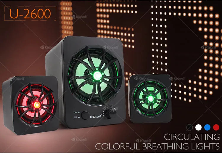 Green 2.1 USB computer speaker with LED lighting on desktop