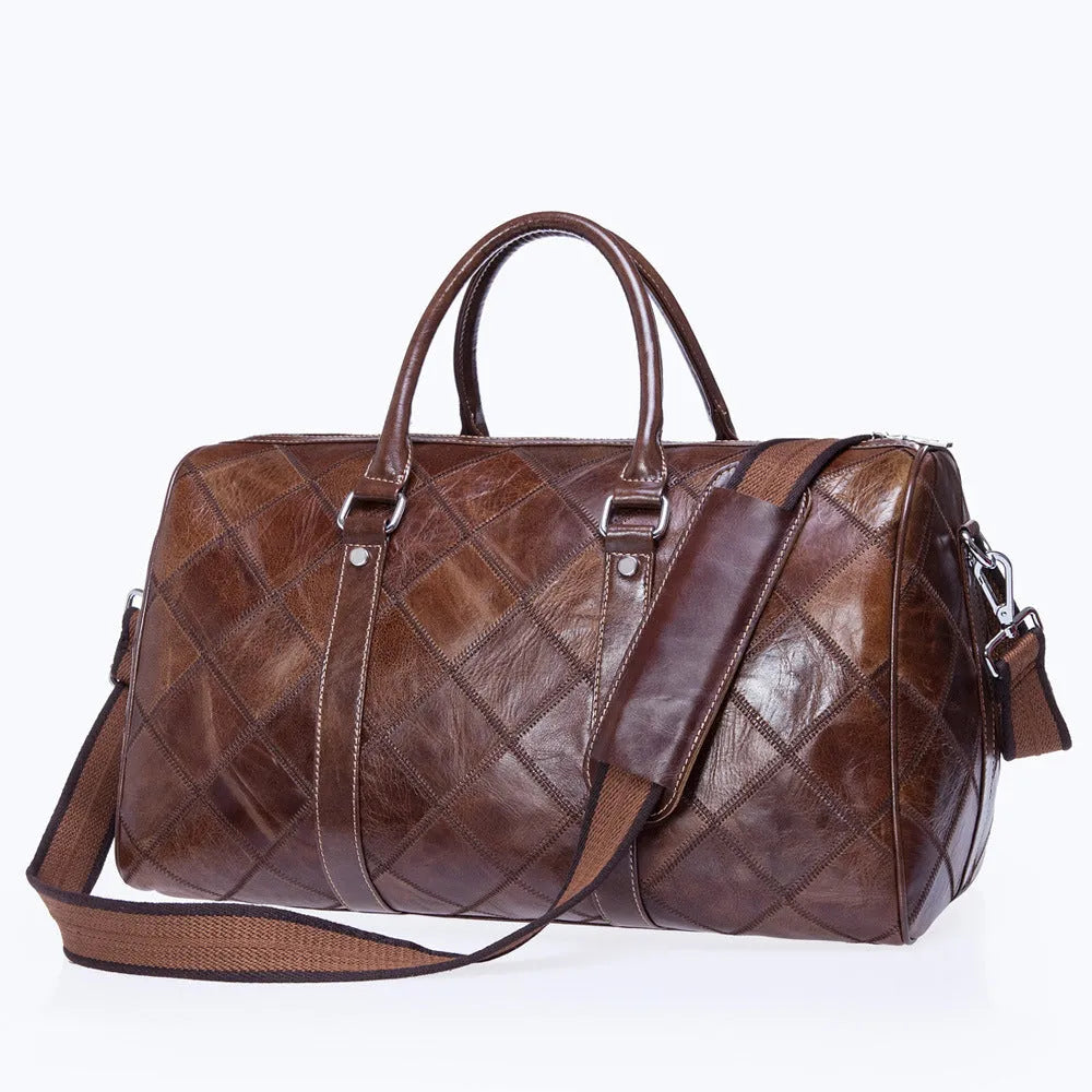 Men's vintage leather duffel bag in black showing internal phone and ID pockets.