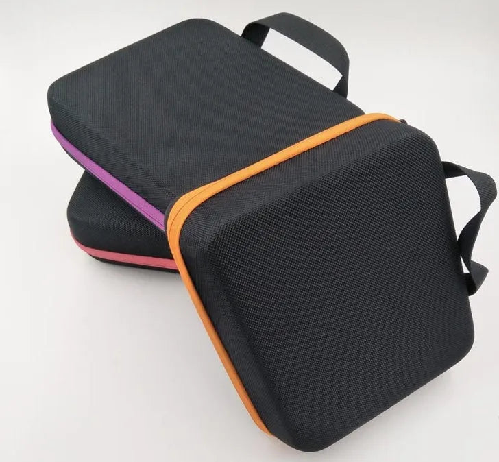 Red EVA essential oil storage bag with 30 compartments open to show bottle slots.