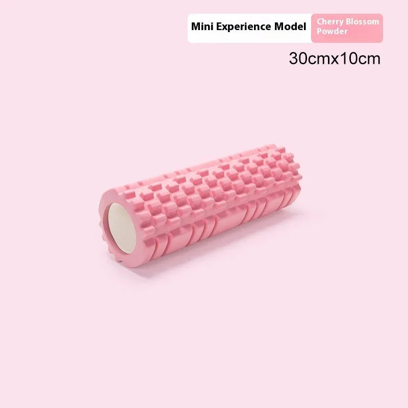 EVA foam roller for fitness in various colours and sizes on a gym floor.