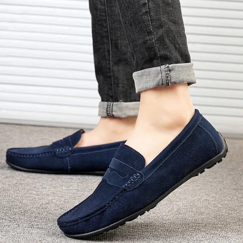 Men's solid colour suede loafers with slip-on design and round toe
