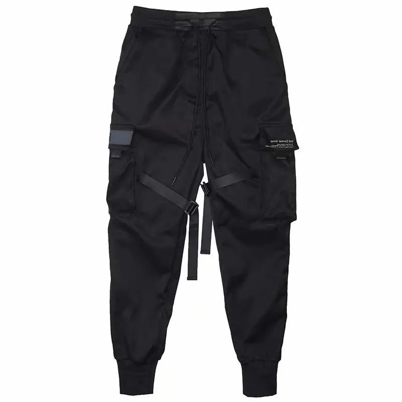 Men's black cotton harem joggers with side pockets and elastic waist, shown with drawstring and Velcro closures