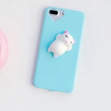 Soft silicone iPhone case with a raised 3D cartoon cat design in pink.