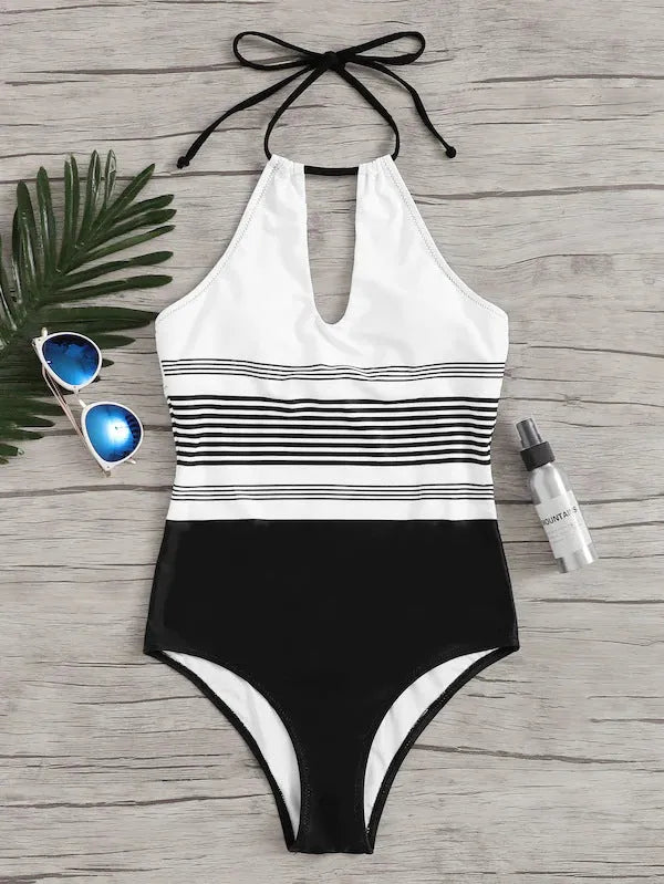 Black striped one-piece swimsuit for women made from nylon fabric, front view