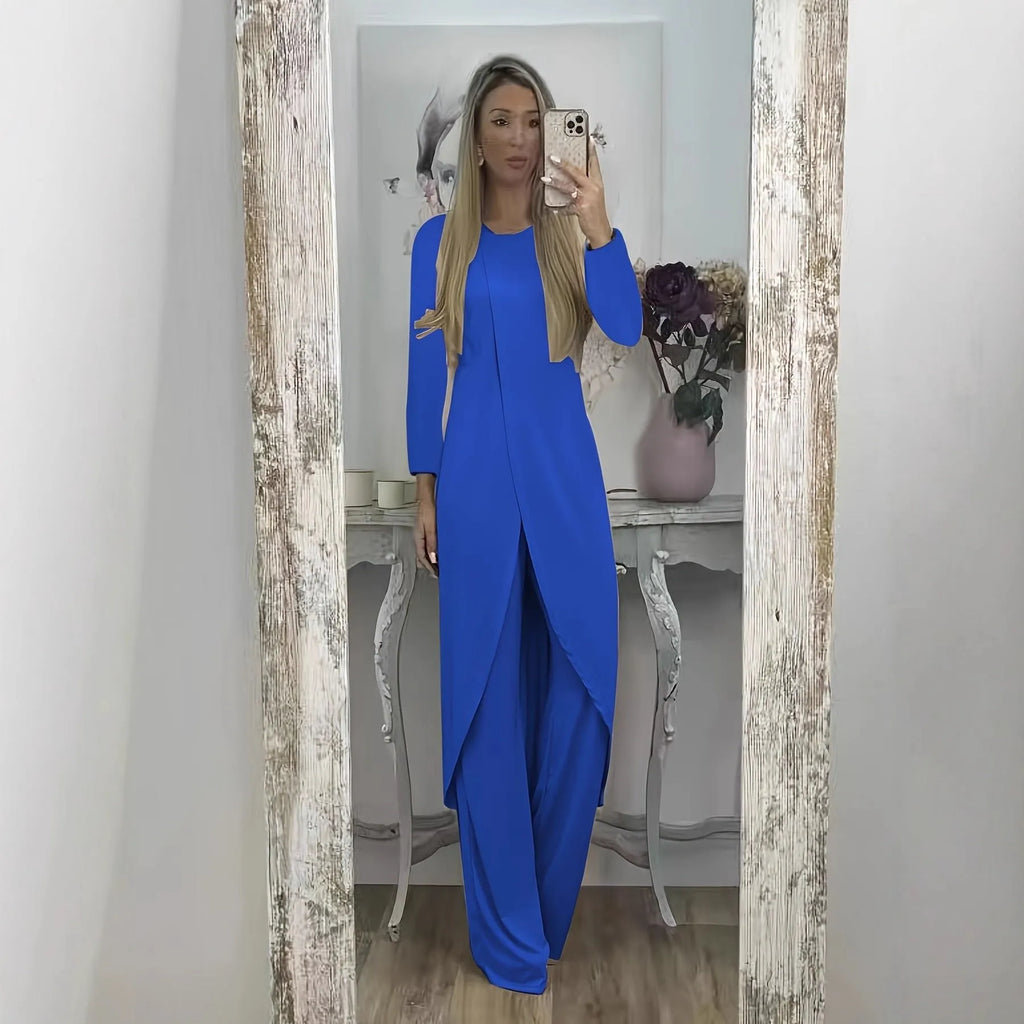 Casual black polyester two-piece lounge set with long sleeve top and loose trousers on a hanger.