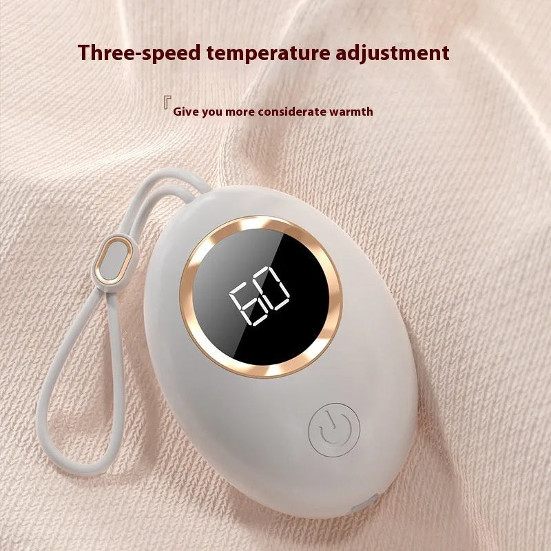 USB digital display hand warmer power bank in pink colour showing aluminium heat dissipation design.