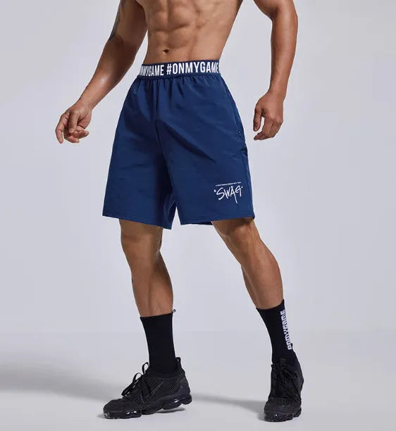 Men's black breathable sports shorts with elastic waistband and loose cropped design