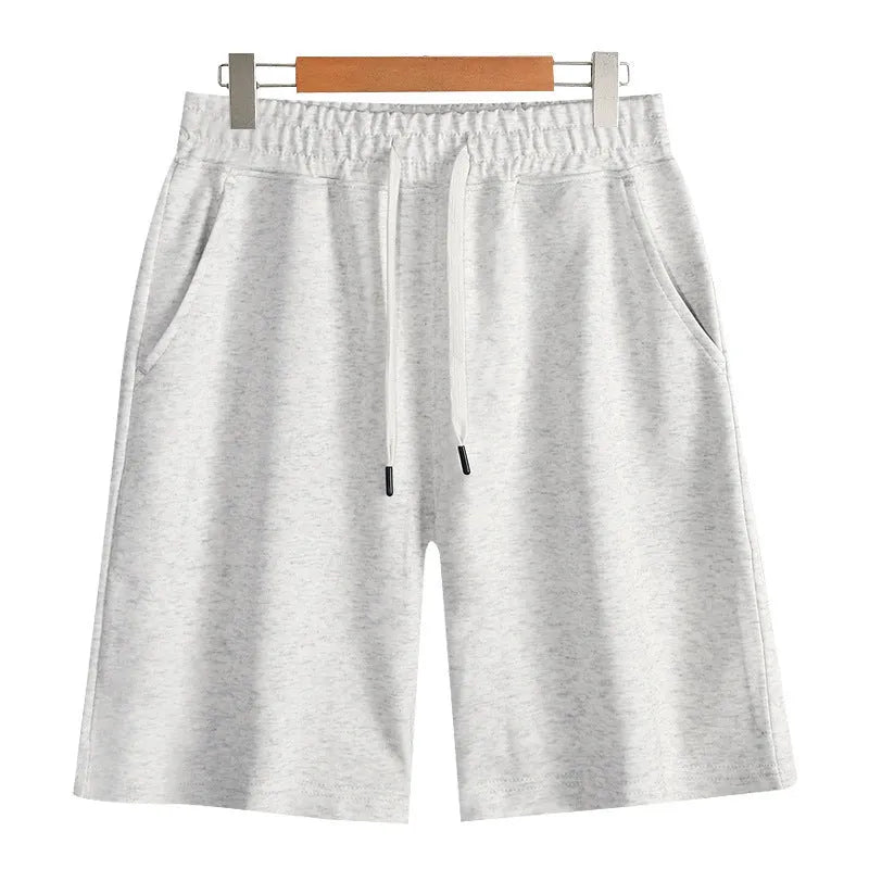 Straight-leg cotton sports shorts in light grey on a neutral background.