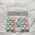Portable rectangular contact lens case in various colours with a compact design.
