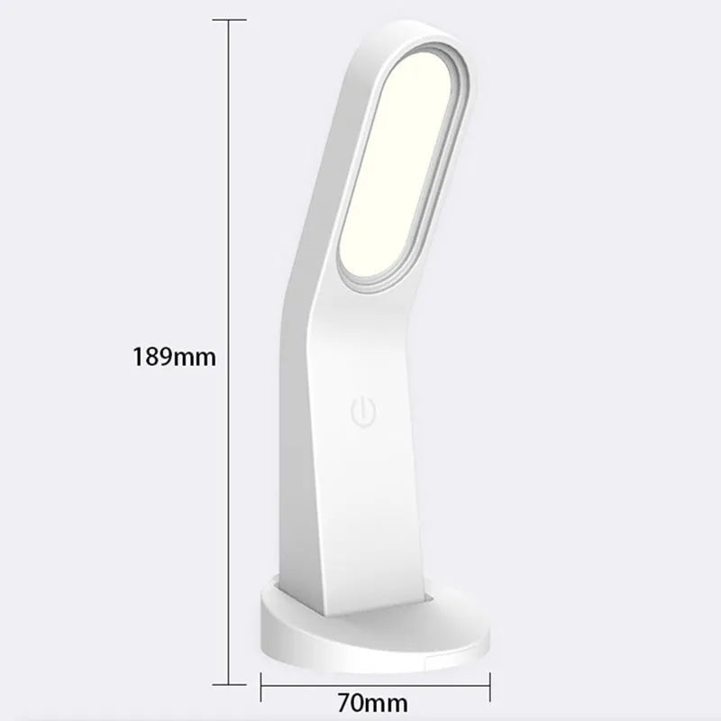 Simple white LED desk lamp with touch control and USB cable on a modern desk