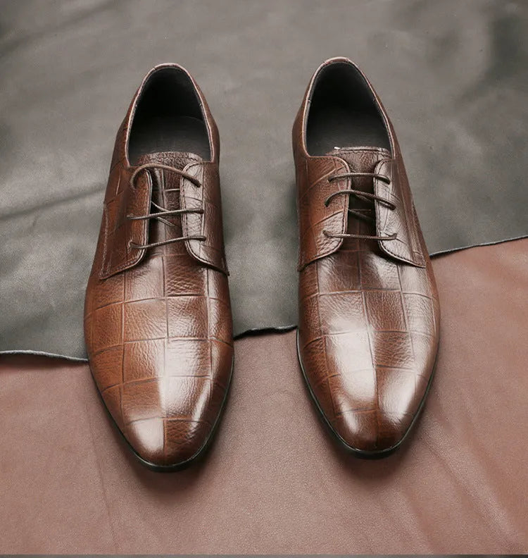 Men's black checkered leather derby shoes with pointed toe and rubber sole