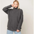 Women's sky blue loose high neck pullover sweater made from thick imitation cashmere fabric.