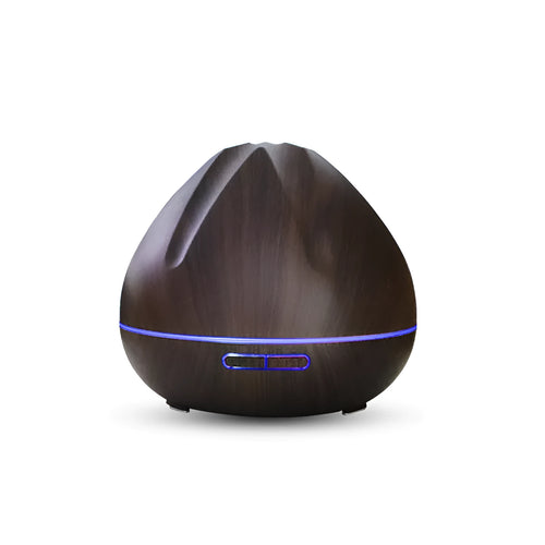 Air humidifier aromatherapy machine with 500ml capacity in dark wood finish on a table
