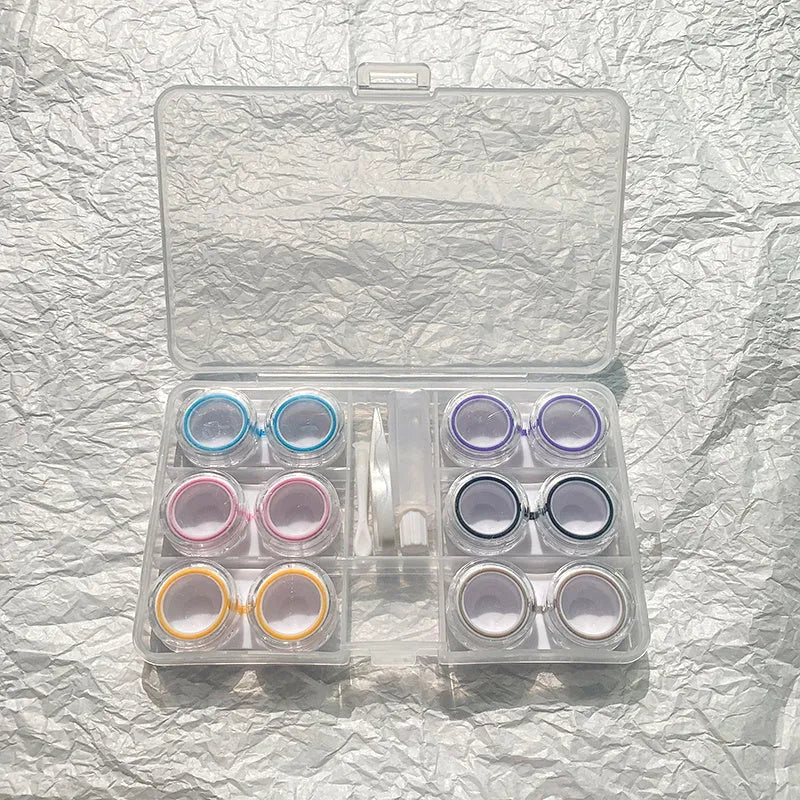 Portable rectangular contact lens case in various colours with a compact design.