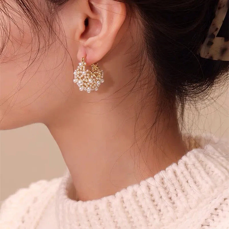 Gold copper flower basket earrings for women with pearl inlay and small bead details