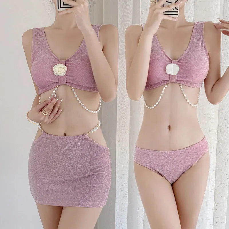 Women's pink and black three-piece bikini swimsuit set with briefs, made from high elasticity polyester fabric.