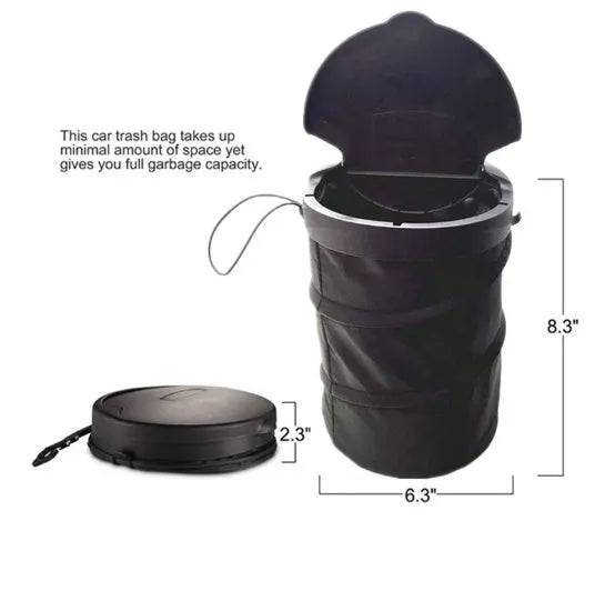 Black cylindrical foldable car trash bin 16x20.5cm with adjustable strap for vehicle cleaning and storage on a seat