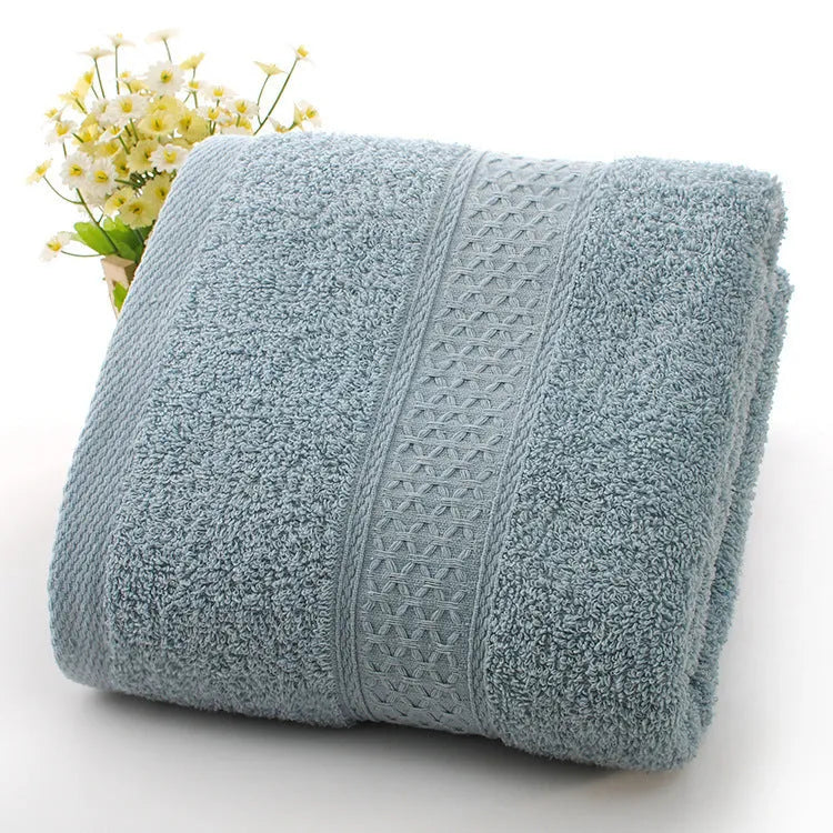 Thickened 800 gsm cotton bath and beach towel shown in apple green colour