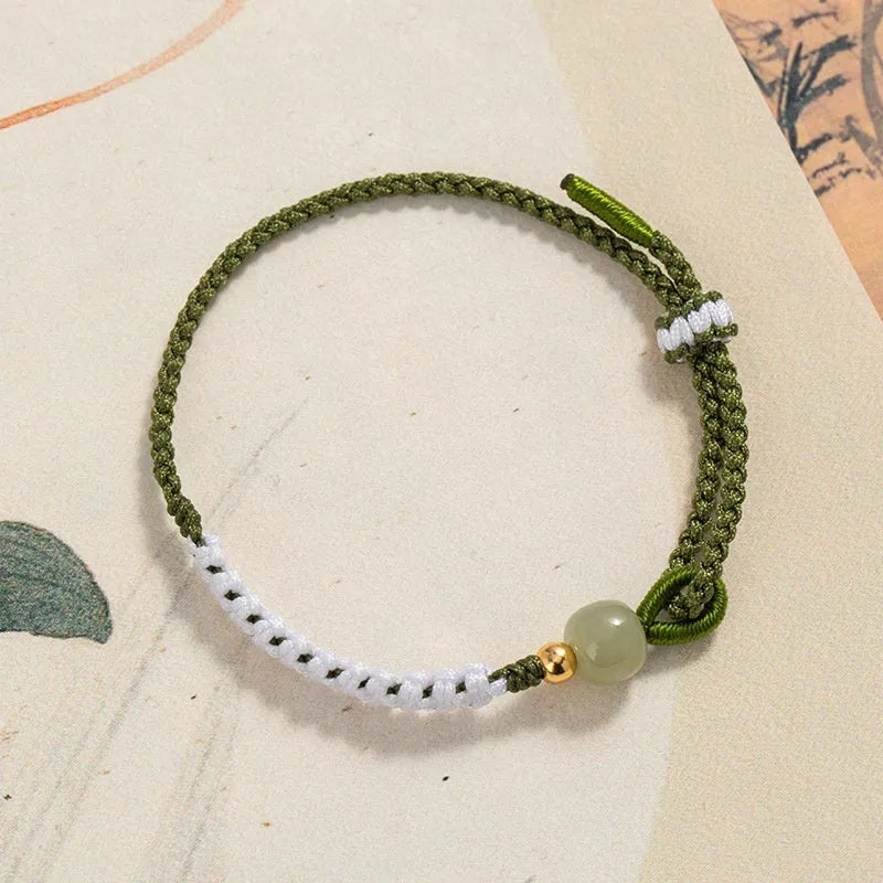 Hetian jade sterling silver Chinese national bracelet with colourful cord carrying strap