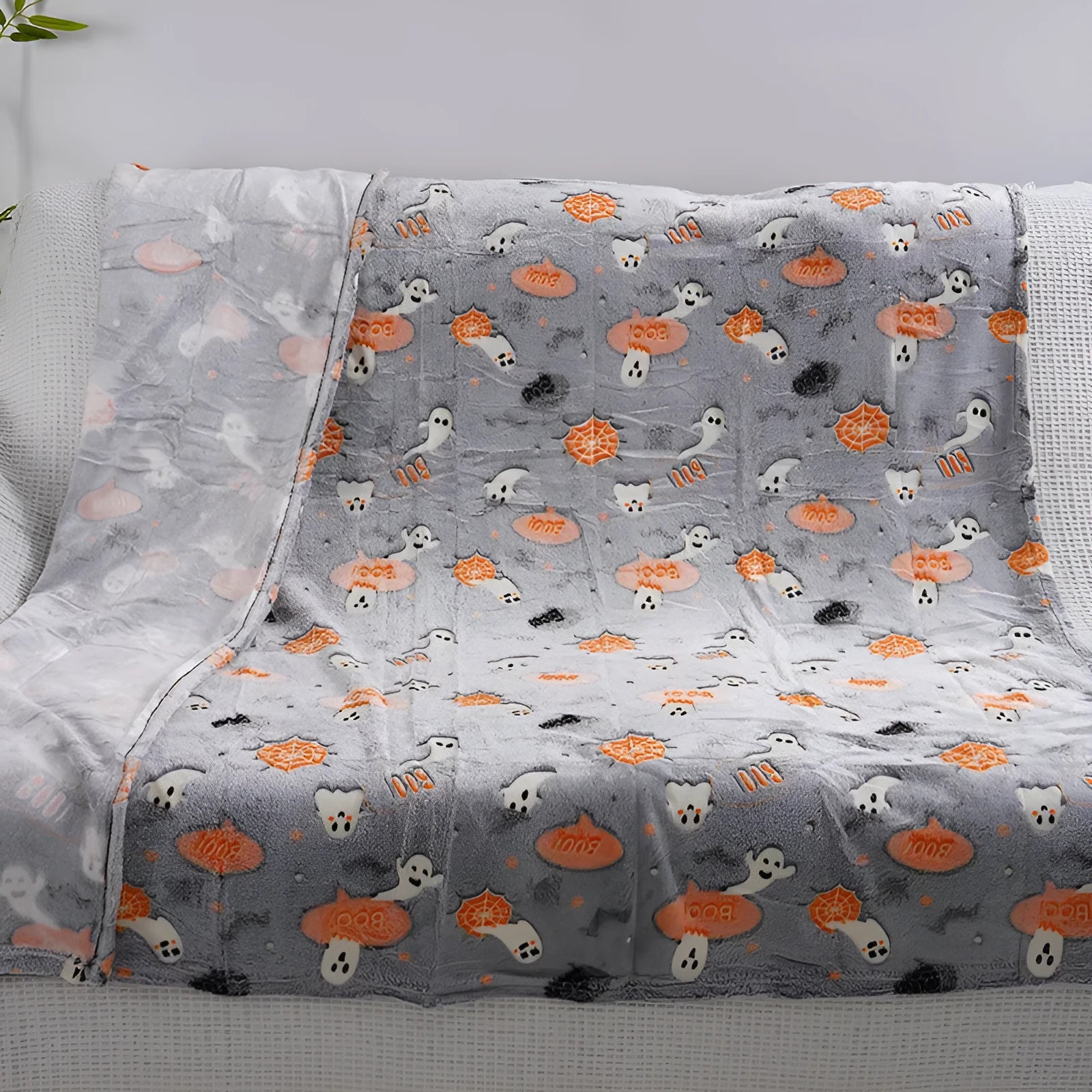 Colourful cartoon print children's flannel blanket, shown in two size options.