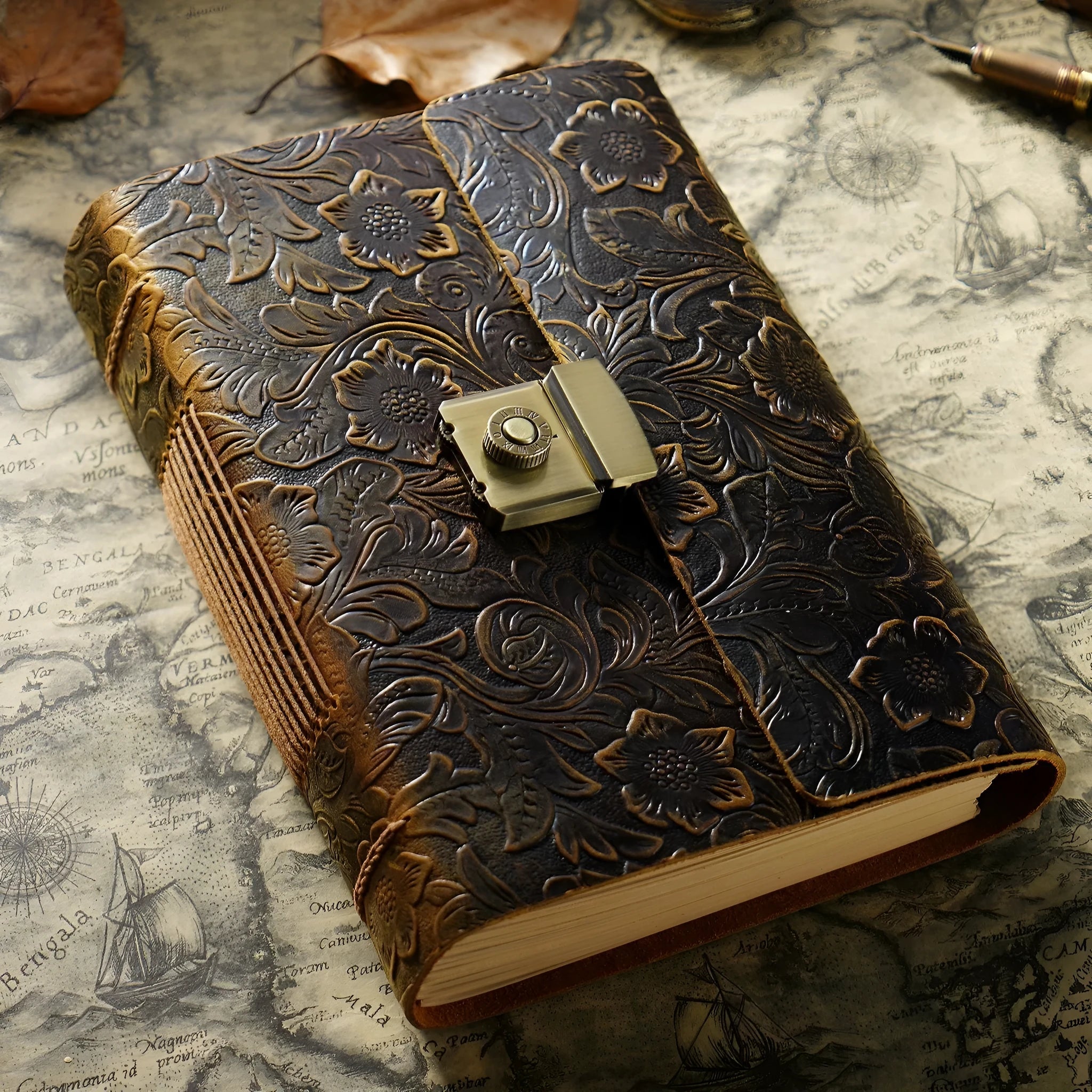 Vintage cowhide leather journal open on blank brown paper pages, A5 size, Crazy Horse brown colour with distressed finish