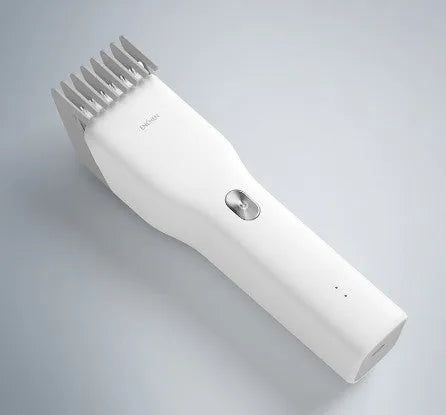 Black cordless electric hair clipper with adjustable length comb and ceramic cutter head on a white background