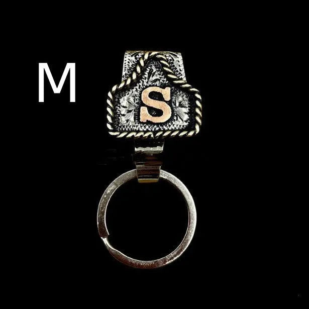 Handmade metal cow tag belt keychain in a selected colour from the A-Z letter range.
